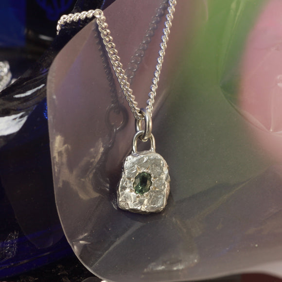 green oval sapphire pendant