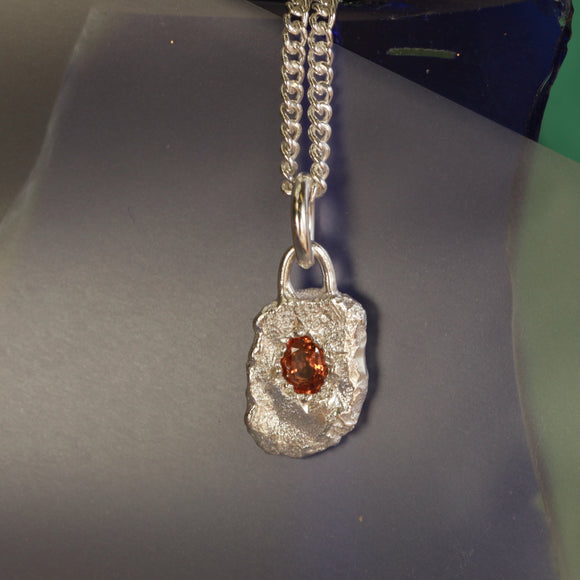 Orange sapphire pendant