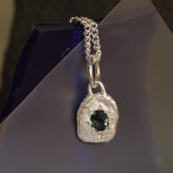 Oval teal sapphire pendant