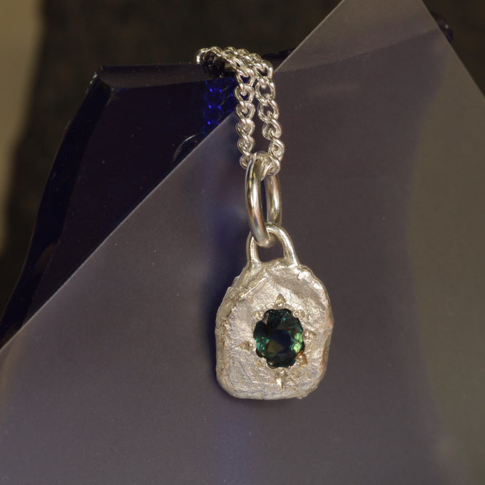 Oval teal sapphire pendant