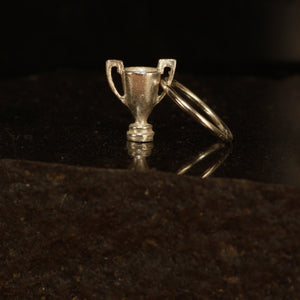 Tiny trophy earring