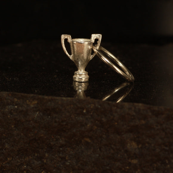 Tiny trophy earring