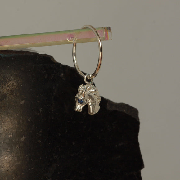 Concerned baby horse earring dark blue