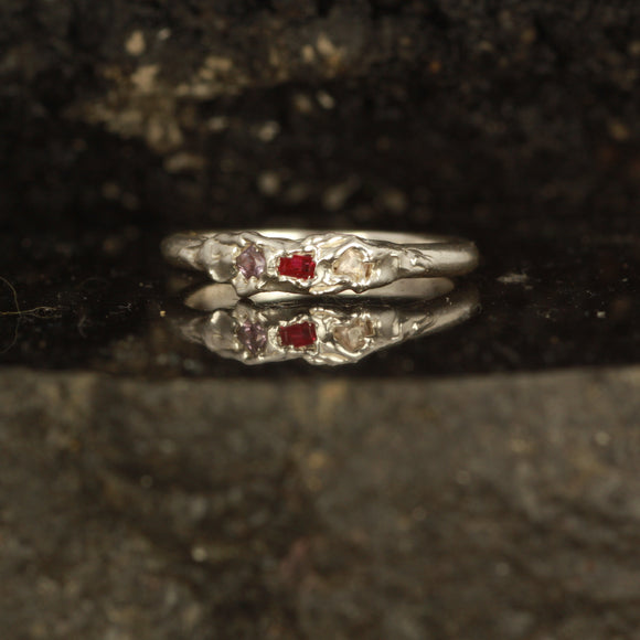 Melted ruby and light pink sapphire ring Size: 6