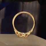 Radiant cut ring pear side stones