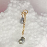 Sliding pearl earring - black tahitian pearls - one off